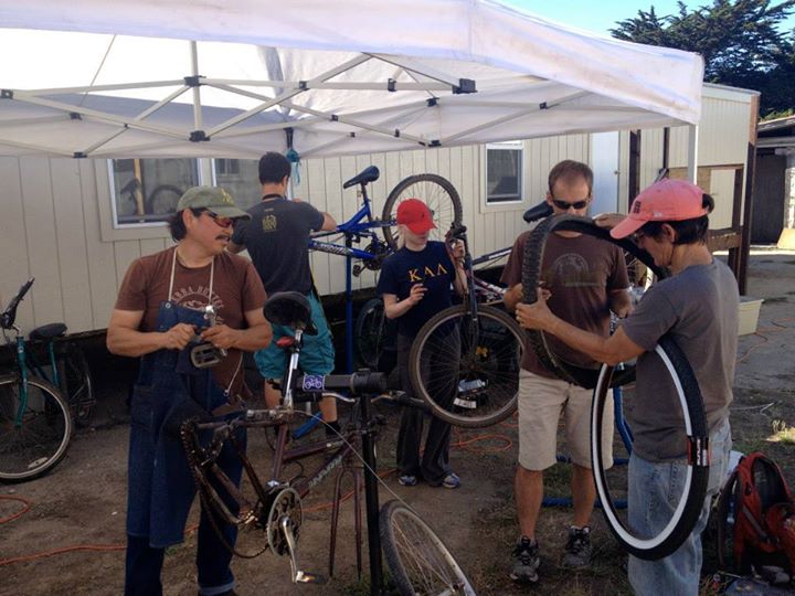 Liz, right in pink hat, at the first Farm Bike Repair Day.