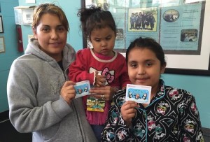 One of the families who received gift cards in 2014.