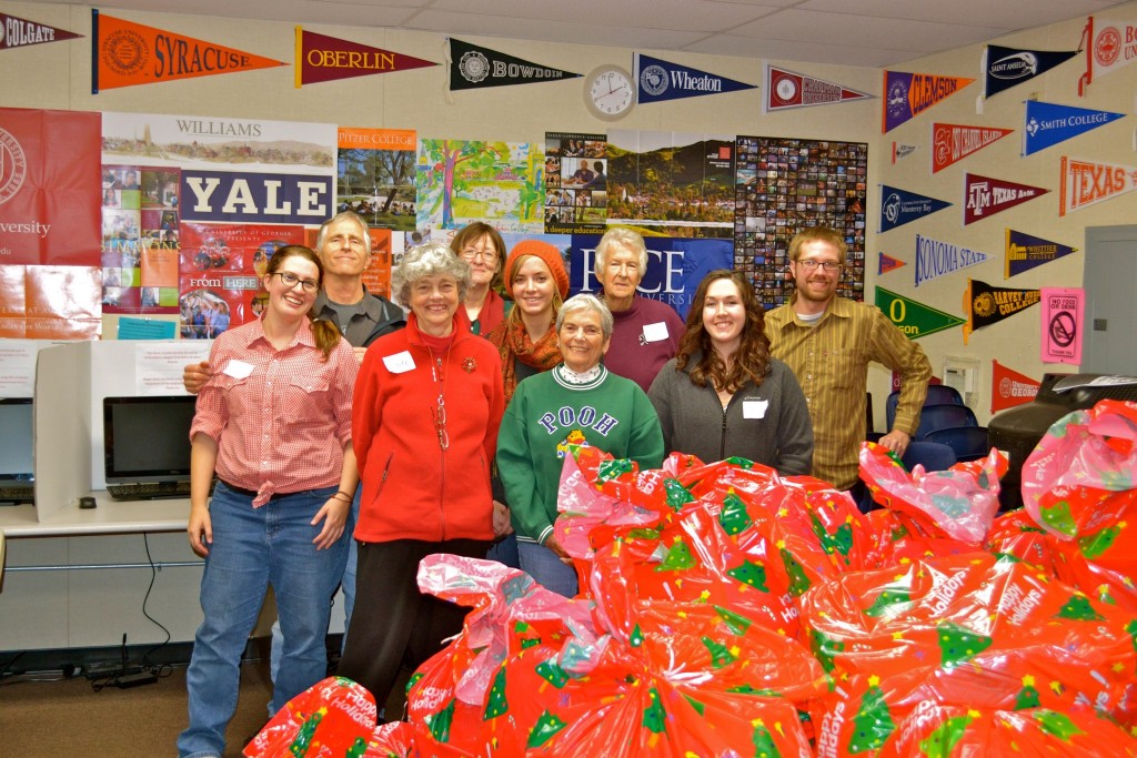 Volunteers from 2012 with donations for La Sala.